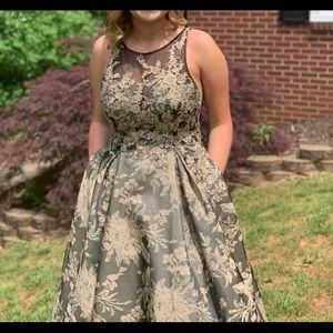 Beautiful black and gold dress with pockets